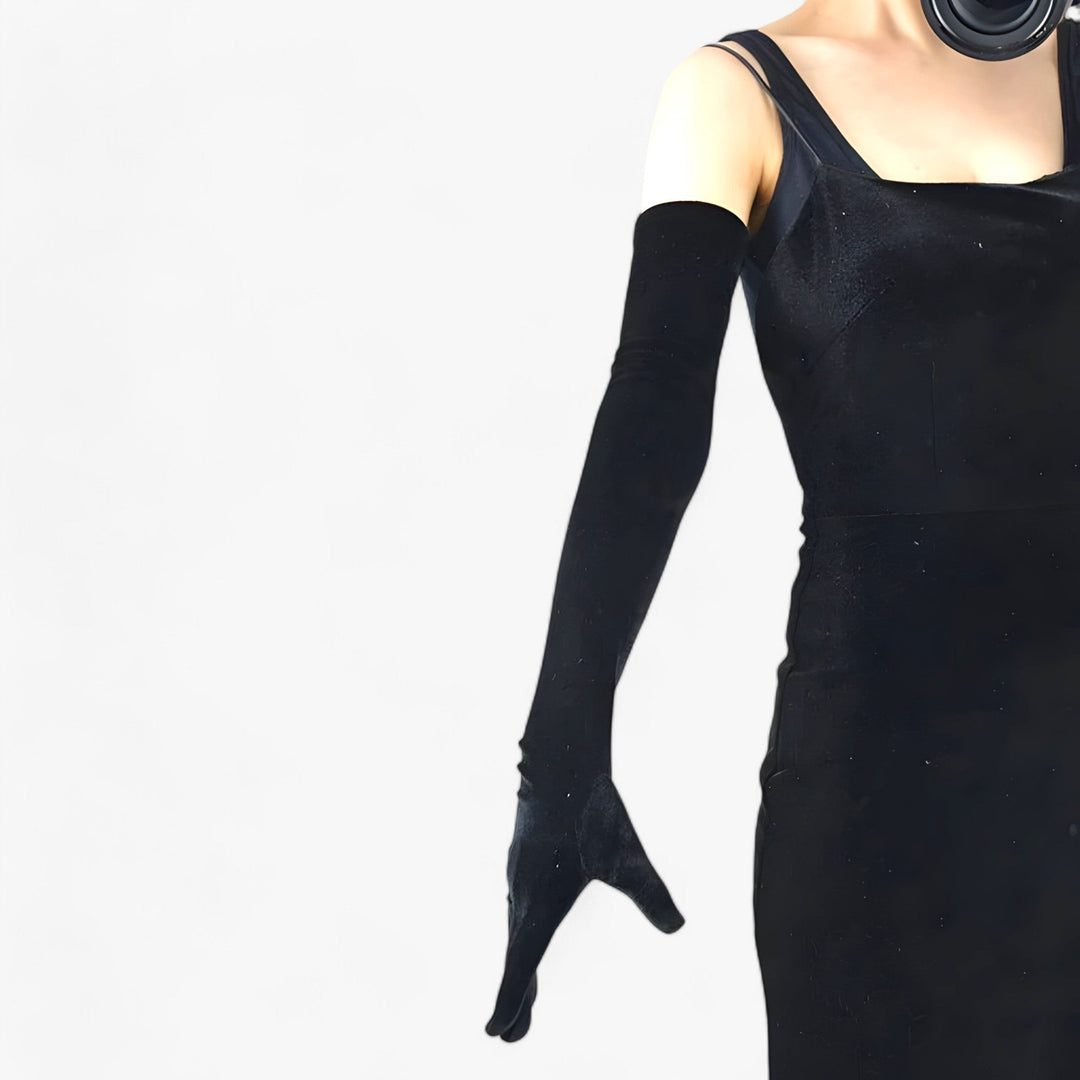 Gants d'hiver vert foncé pour femme, style rétro chic. Offrent chaleur et confort optimal durant l'hiver.