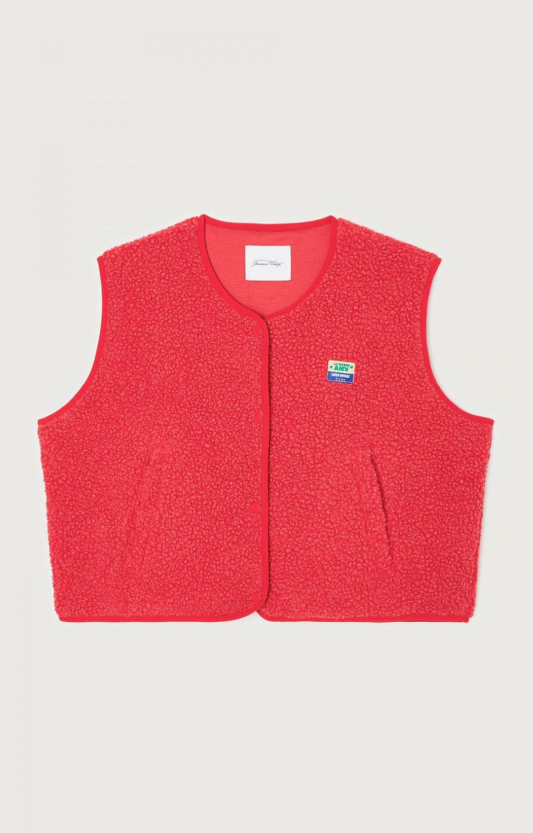 Gilet femme en laine d'agneau, chic et polyvalent, à porter ouvert ou boutonné.