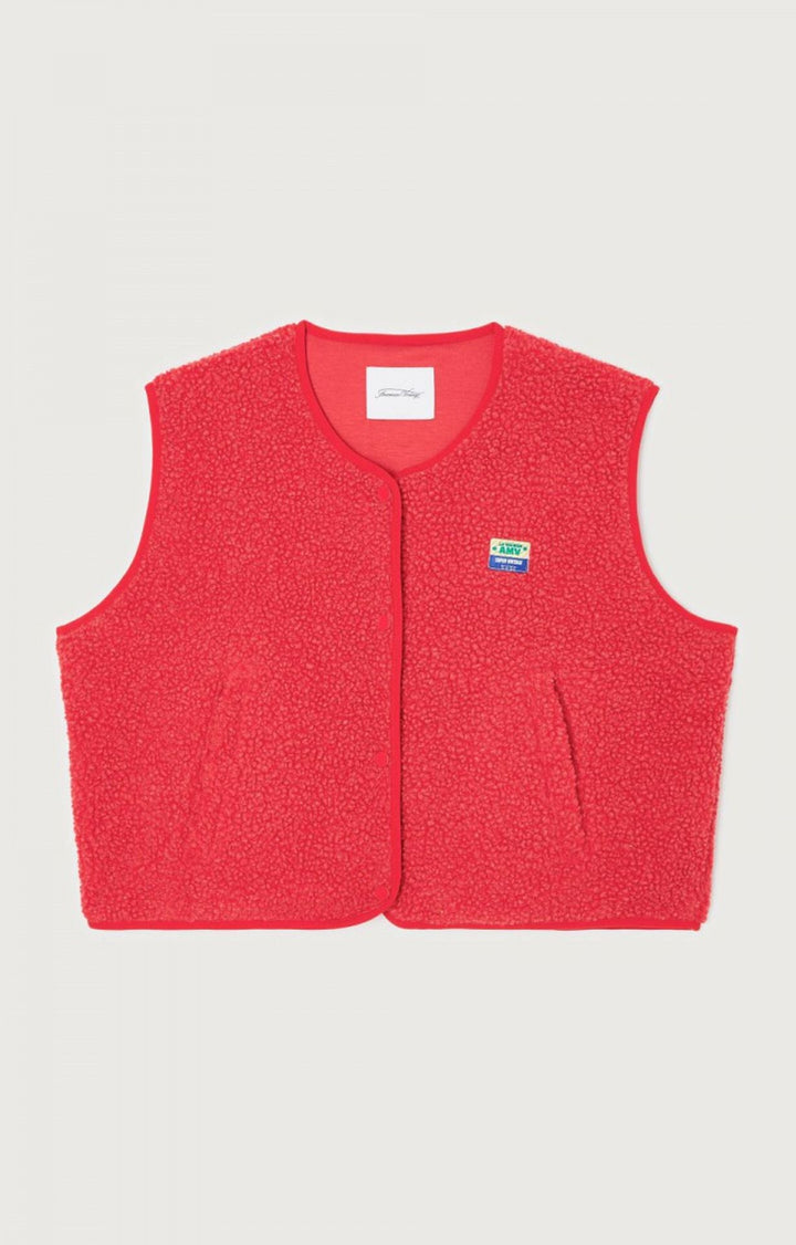Gilet femme en laine d'agneau, chic et polyvalent, à porter ouvert ou boutonné.