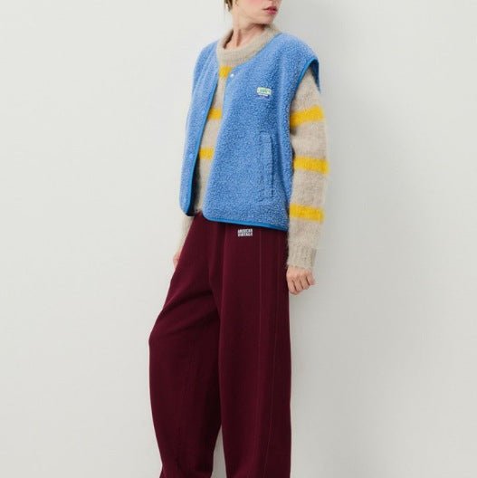 Mode automne-hiver: gilet femme en laine d'agneau, doux, chaud et élégant pour toutes.