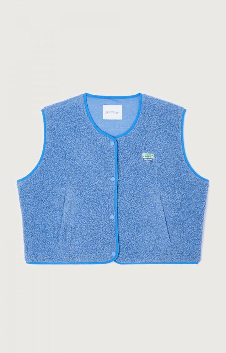 Laine d'agneau pour femme: gilet sans manches doux et élégant, un must-have chic.