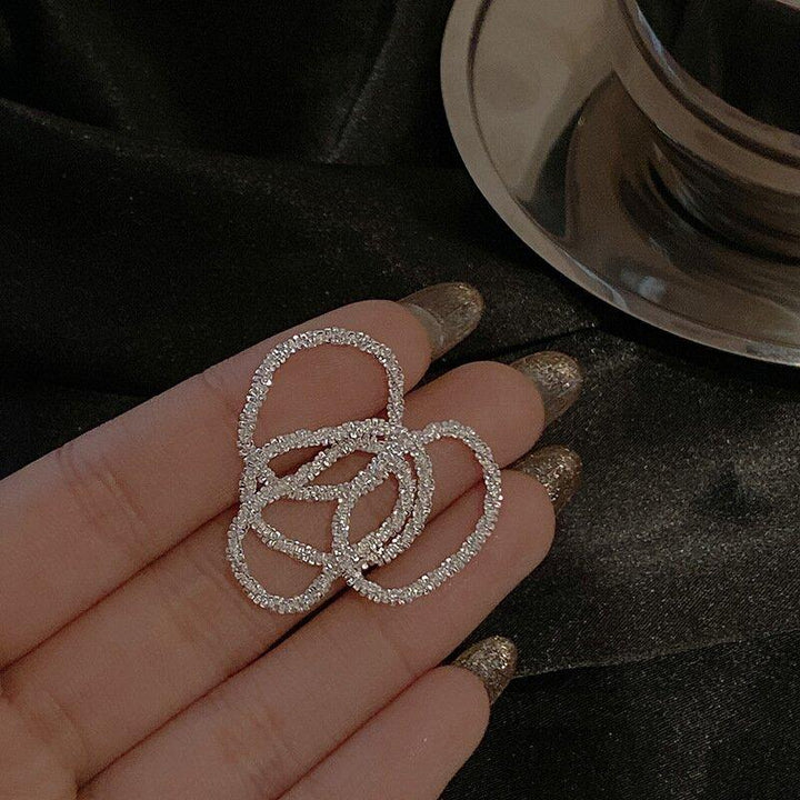 Bague élégante en argent 925 pour femme, motif étoile, taille ajustable. Un bijou tendance pour le quotidien.