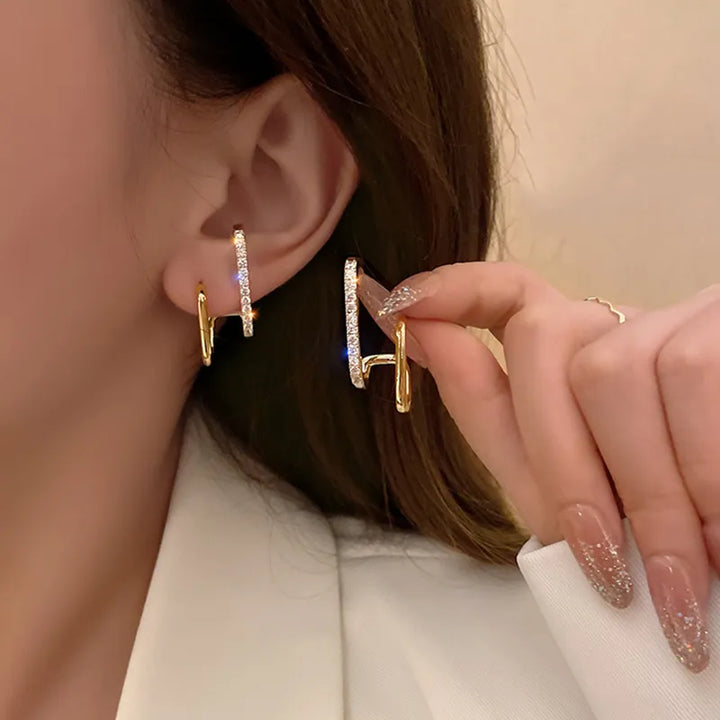 Boucles d'oreilles mode femmes, griffes en cristal étincelant, parfaites pour sublimer votre look.
