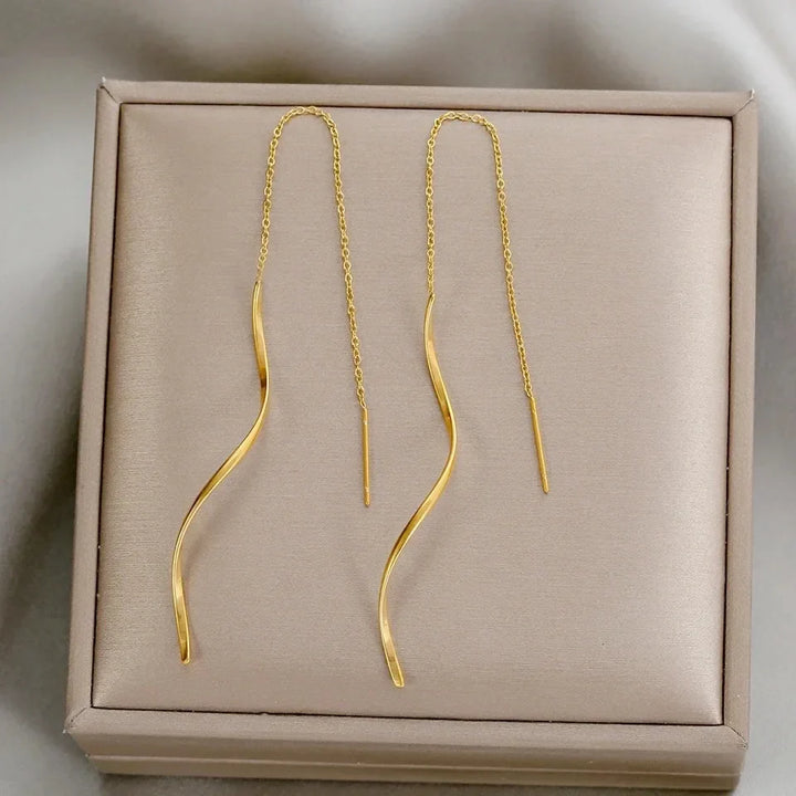 Chic boucles d'oreilles vagues pendantes, pour femmes élégantes, look contemporain, finition or.