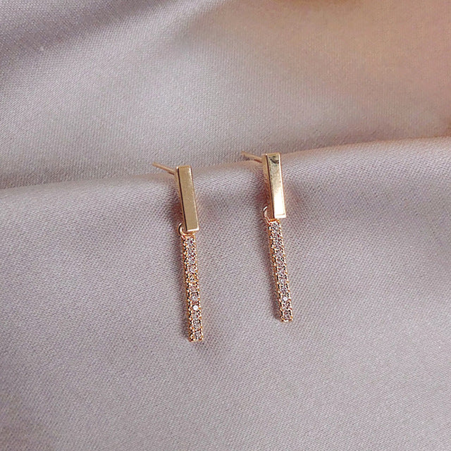 Boucles d'oreilles licorne durables en acier inoxydable pour femmes, bijoux fantaisie avec zirconium, style unique.