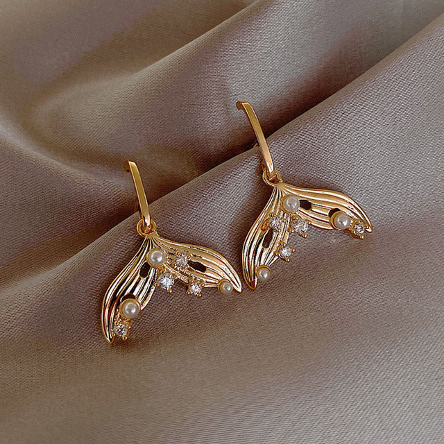 Boucles d'oreilles licorne fantaisie sur fond pastel, bijoux mignons pour femmes, en acier inoxydable.
