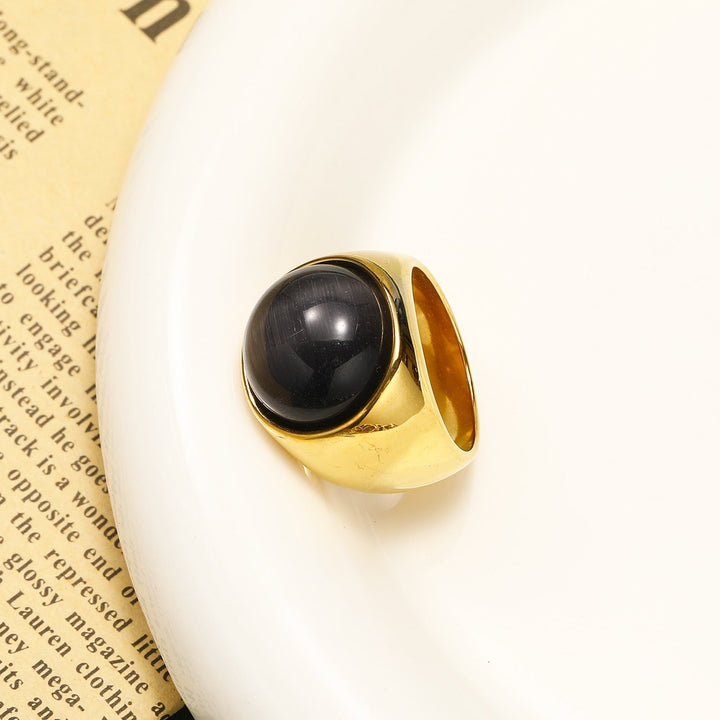 Bague femme avec pierre Oeil de Tigre, élégance mode, pierre précieuse unique et distinctive.