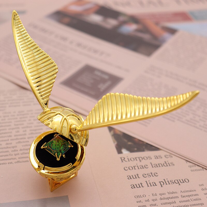 Boîte à anneau fantaisie "Orb Ailée" dorée, écrin unique pour bague. Cadeau luxe et original.