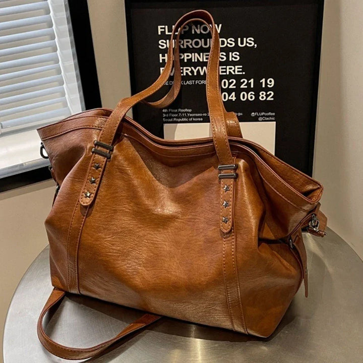 Sac d'étudiante Inka grand format, pratique pour livres et ordinateur portable. Design fourre-tout, idéal pour cours.