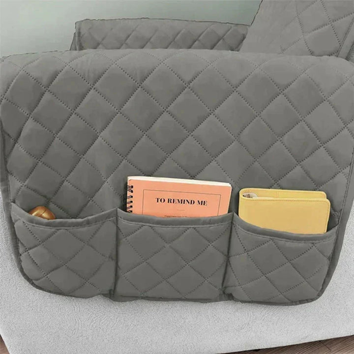 Housse de fauteuil extensible bordeaux, rénove et protège votre mobilier du salon avec élégance.