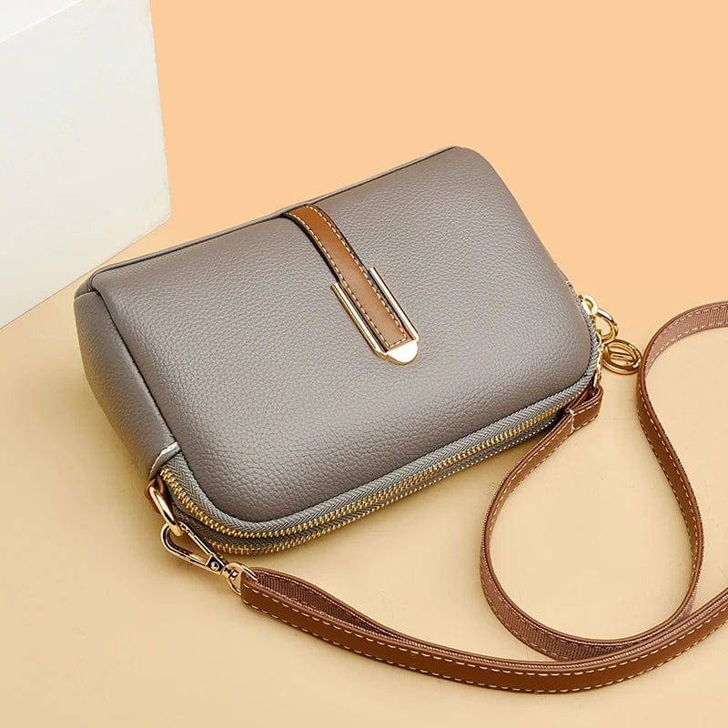 Sac à main femme, cuir vegan marron clair, design polyvalent et chic pour le travail.