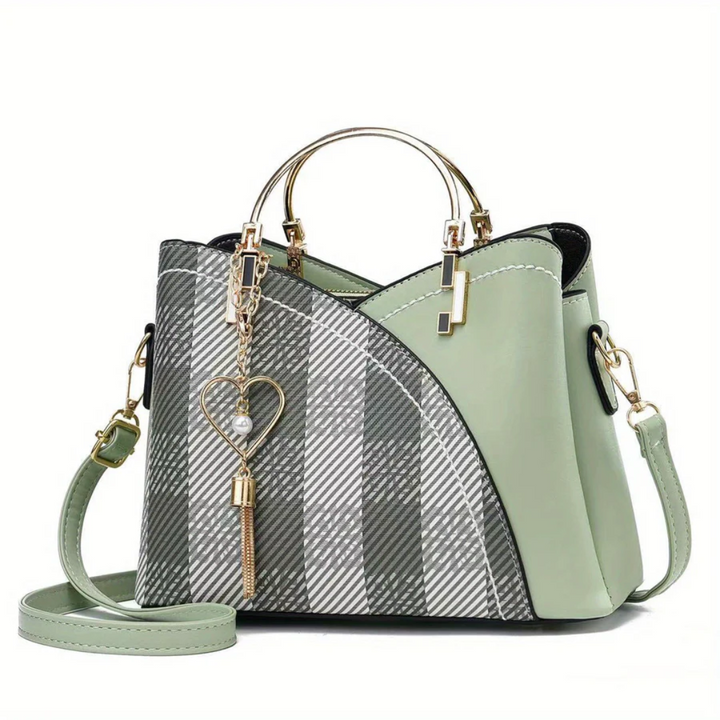 Gros plan sur un sac à main femme, texture détaillée, accessoire mode élégant et polyvalent.
