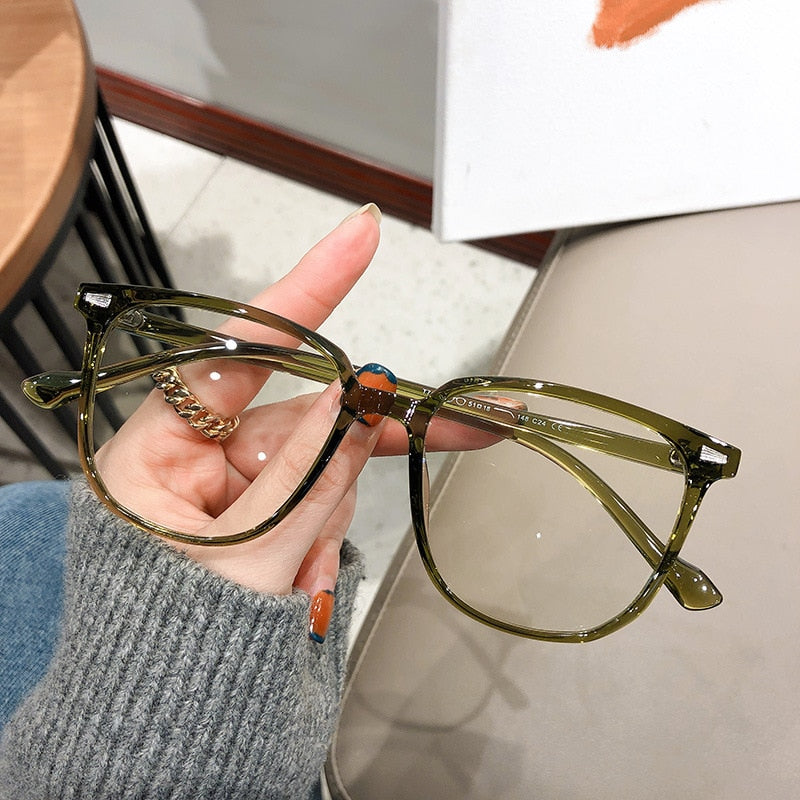 Lunettes de myopie unisexes avec verres anti-lumière bleue, améliorant la vision et le confort digital.