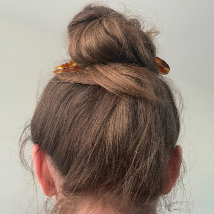 Épingles à cheveux en U polyvalentes pour chignons élégants et coiffures soignées, adaptées à toutes les occasions.