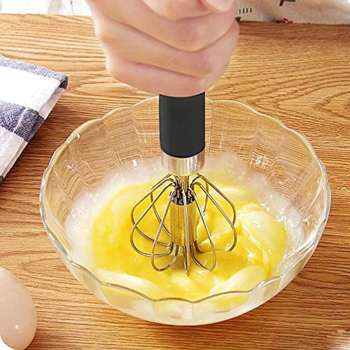 Fouet inox semi-automatique, ustensile de cuisine rapide et précis pour battre et mélanger vos préparations.