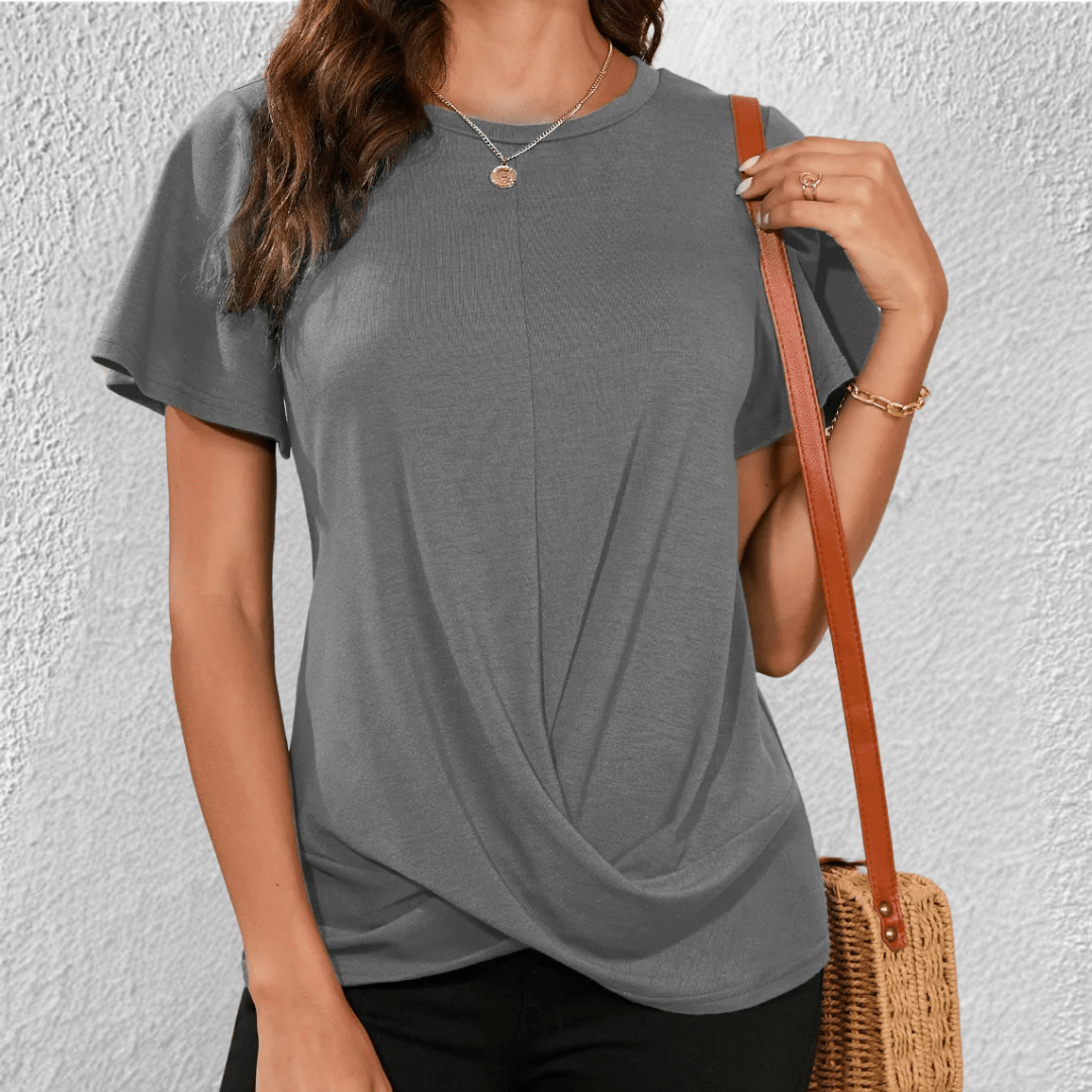 Haut femme élégant et moderne à col rond, parfait pour une tenue décontractée ou sophistiquée, effet ventre plat.