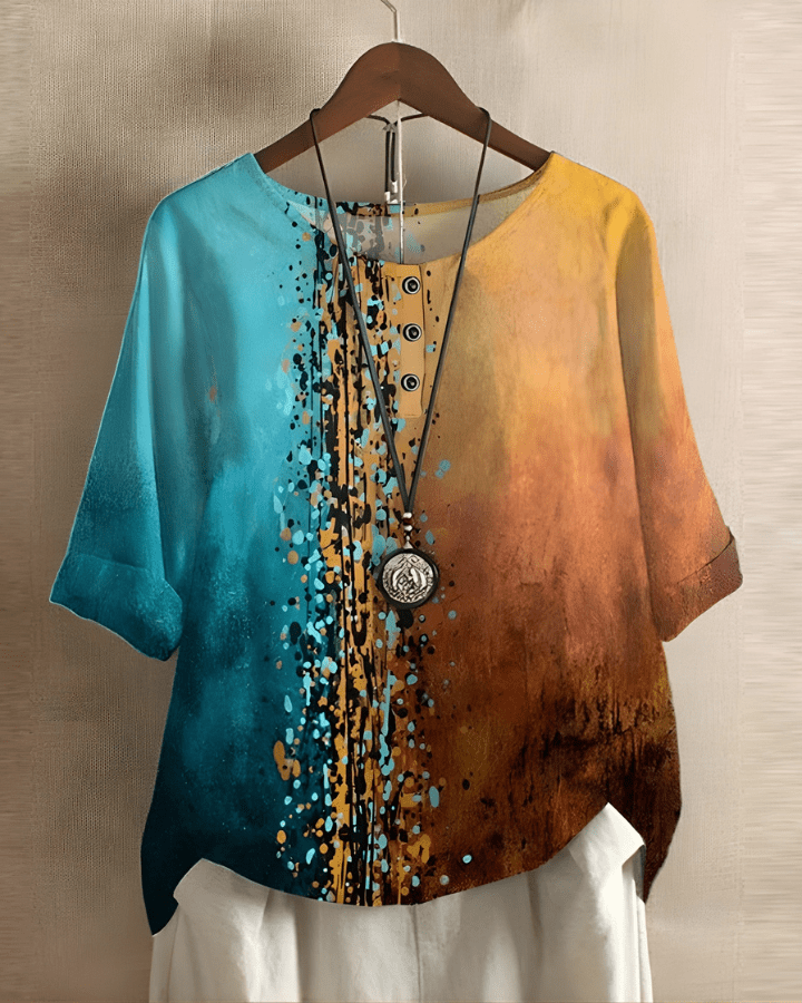 Tunique femme confortable en tissu léger. Imprimé géométrique moderne, parfaite pour un style décontracté et aérien.