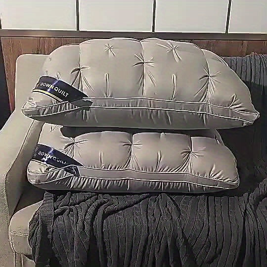 Coussin cervical ergonomique blanc pour adultes, soutien optimal du cou et de la tête, favorise un sommeil réparateur.