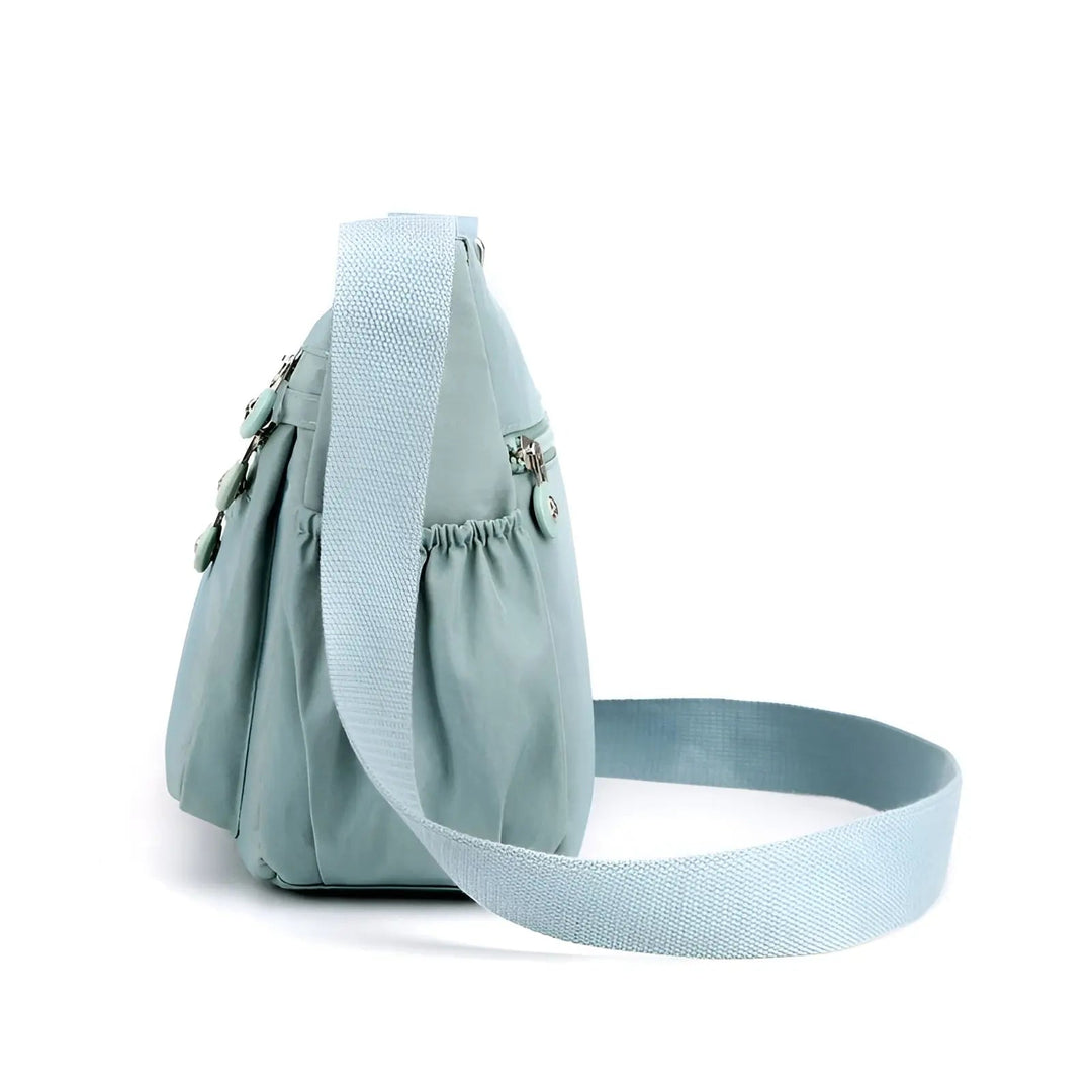 Élégant sac à bandoulière bleu foncé pour femmes, imperméable, très spacieux et pratique pour voyage ou quotidien.