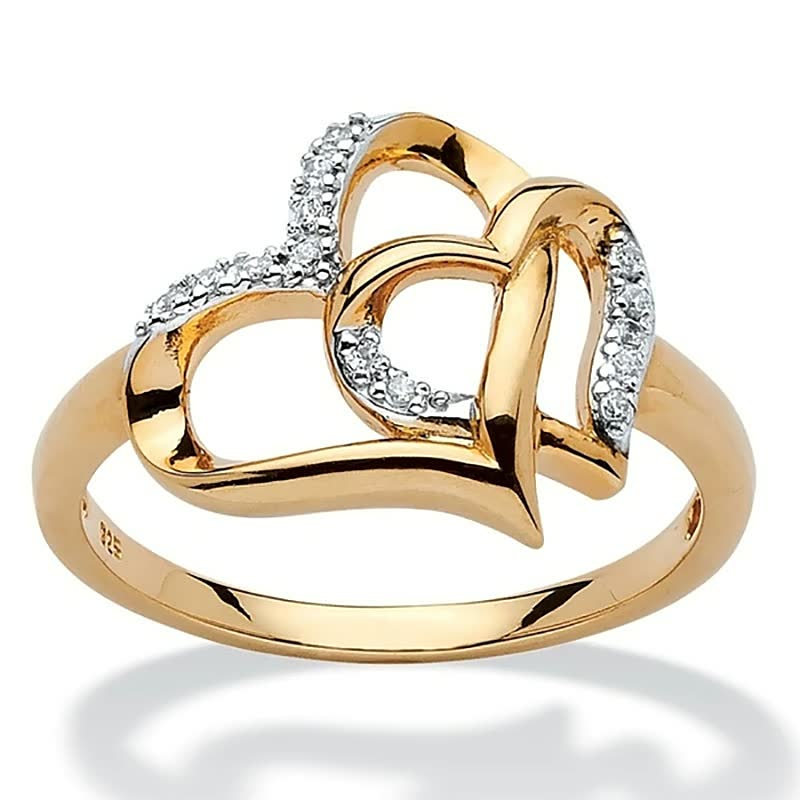 Bague femme en forme de cœur, ornée de détails scintillants, idéale pour un style élégant.