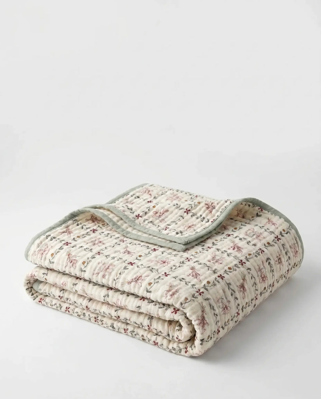 Couverture en coton doux, naturelle et respirante, pour un confort élégant en toutes saisons.