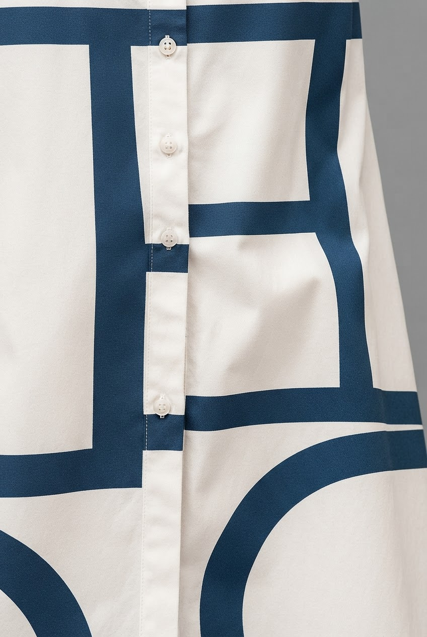 Robe midi fluide et décontractée pour femme. Style sophistiqué et polyvalent, parfaite pour un confort estival chic.