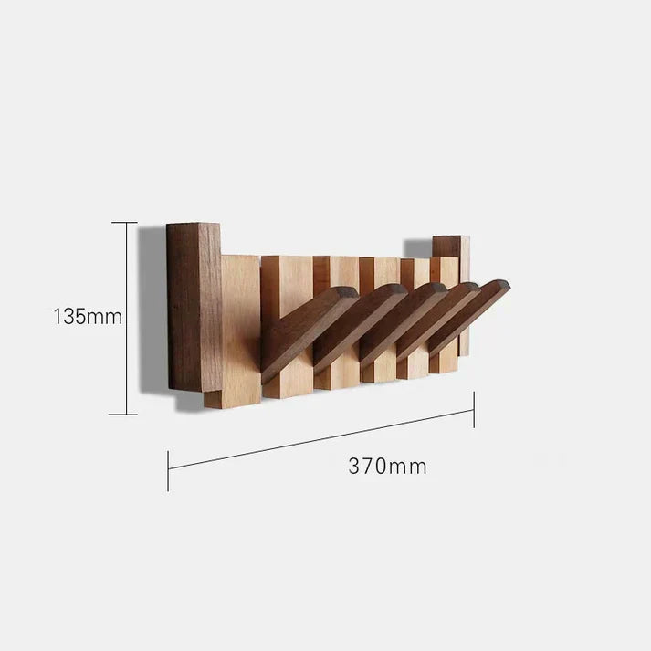 Porte-manteau mural escamotable design piano pour une entrée épurée. Accroches discrètes et style contemporain.