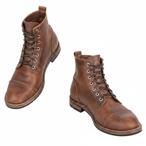Bottines homme vintage à lacets avec bout renforcé, idéales pour l'automne-hiver, style robuste et élégant.