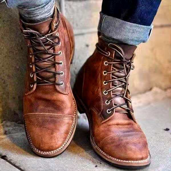 Chaussures bottines homme vintage avec lacets solides et bout renforcé. Parfaites pour un look casual hivernal.