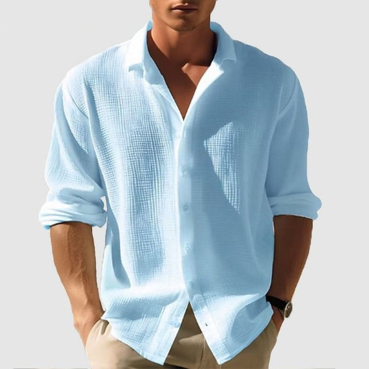 Chemise homme élégante et confortable, manches longues, regular fit, boutons, col classique, mode masculine.