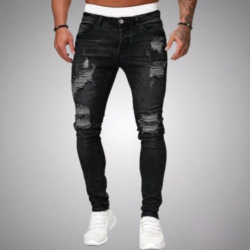 Pantalon homme slim fit en denim déchiré, très confortable et polyvalent. Idéal pour un look basique chic.