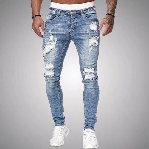 Jean slim fit homme distressed avec déchirures, parfait pour la mode urbaine et les tenues décontractées.