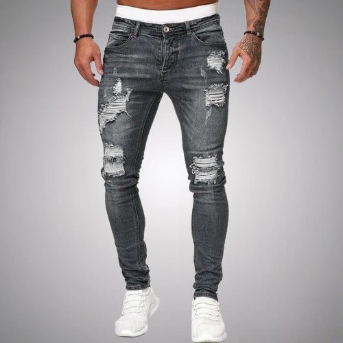 Jean homme slim fit déchiré, un basique chic et confortable pour une allure tendance et décontractée.