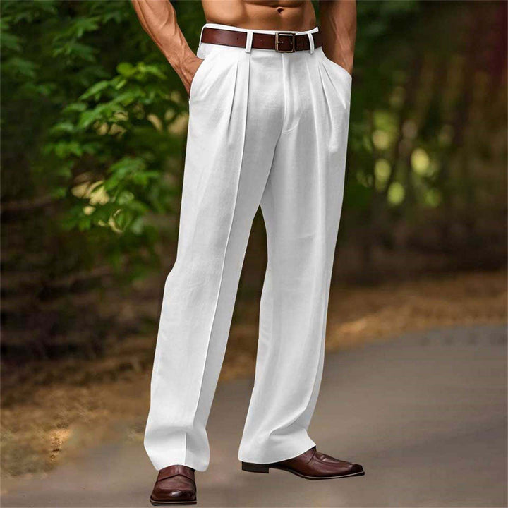 Pantalon habillé homme, taille haute, coupe droite. Un essentiel de la mode masculine, chic et formel.