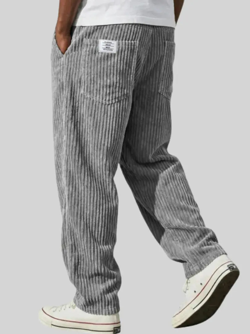Pantalon homme velours côtelé noir, confortable avec ceinture élastique.