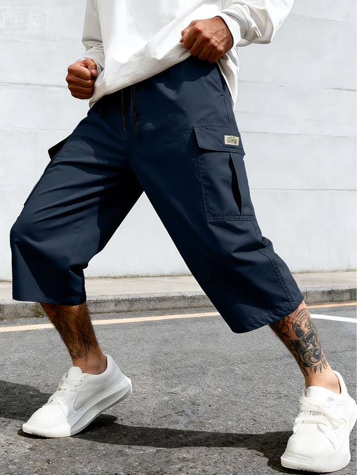 Short cargo homme décontracté avec multiples poches fonctionnelles et cordon de serrage ajustable pour l'été.