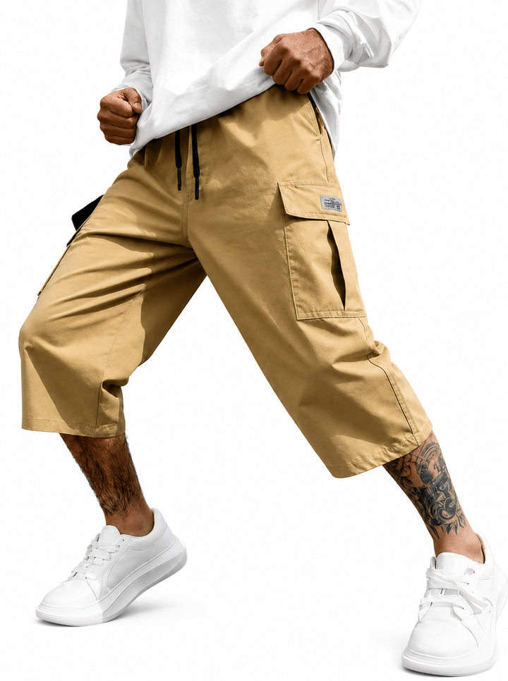 Short cargo homme en tissu confortable, stylé décontracté, avec poches et cordon de serrage, parfait pour l'été.