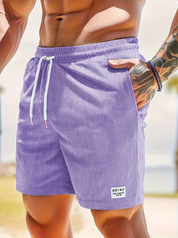 Short de bain côtelé pour homme, vert olive, parfait pour la plage, style et détente assurés.