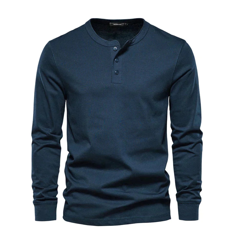 T-shirt Henley homme manches longues, col rond et patte de boutonnage. Style casual élégant pour mode masculine.