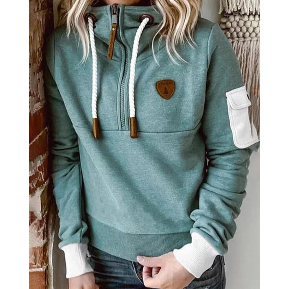 Texture douce du pull à capuche femme Aarohi, qualité premium. Confortable et décontracté pour l'automne-hiver.