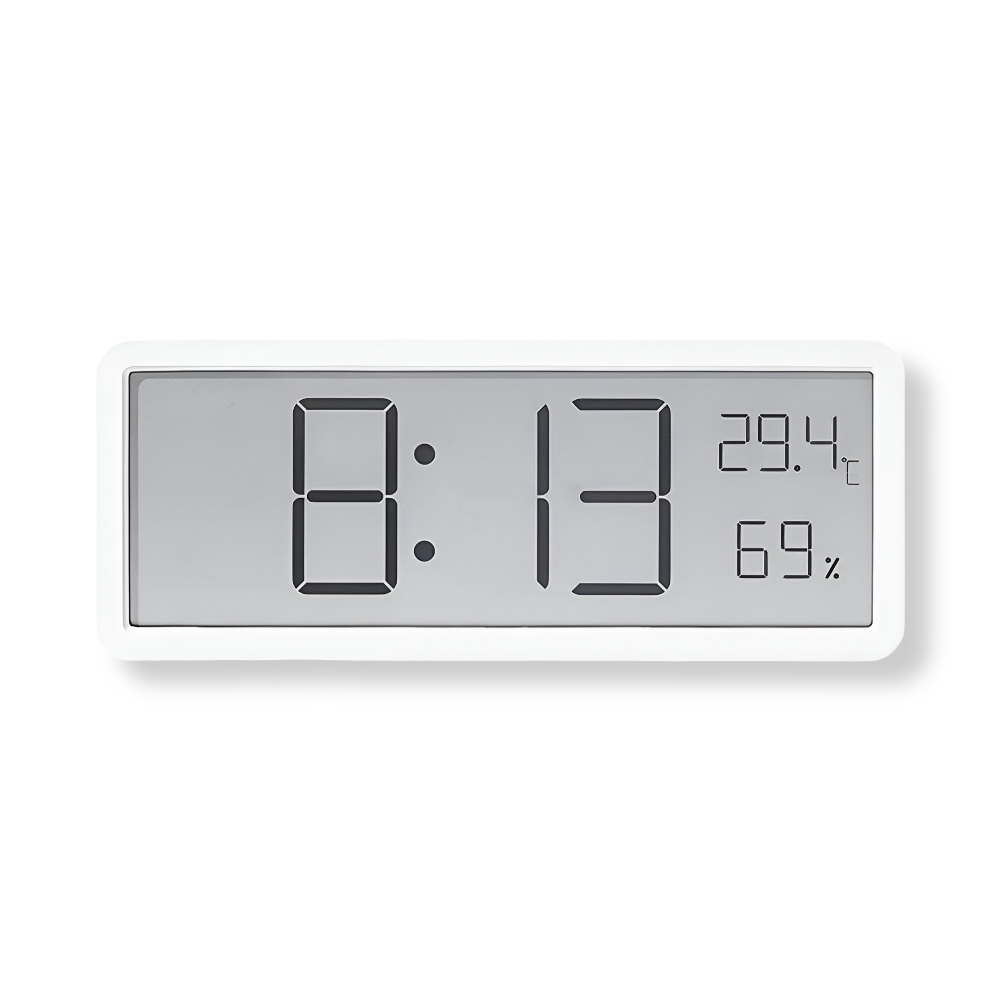 Horloge murale LED numérique minimaliste avec capteurs de température et d'humidité, idéale pour salon ou bureau.