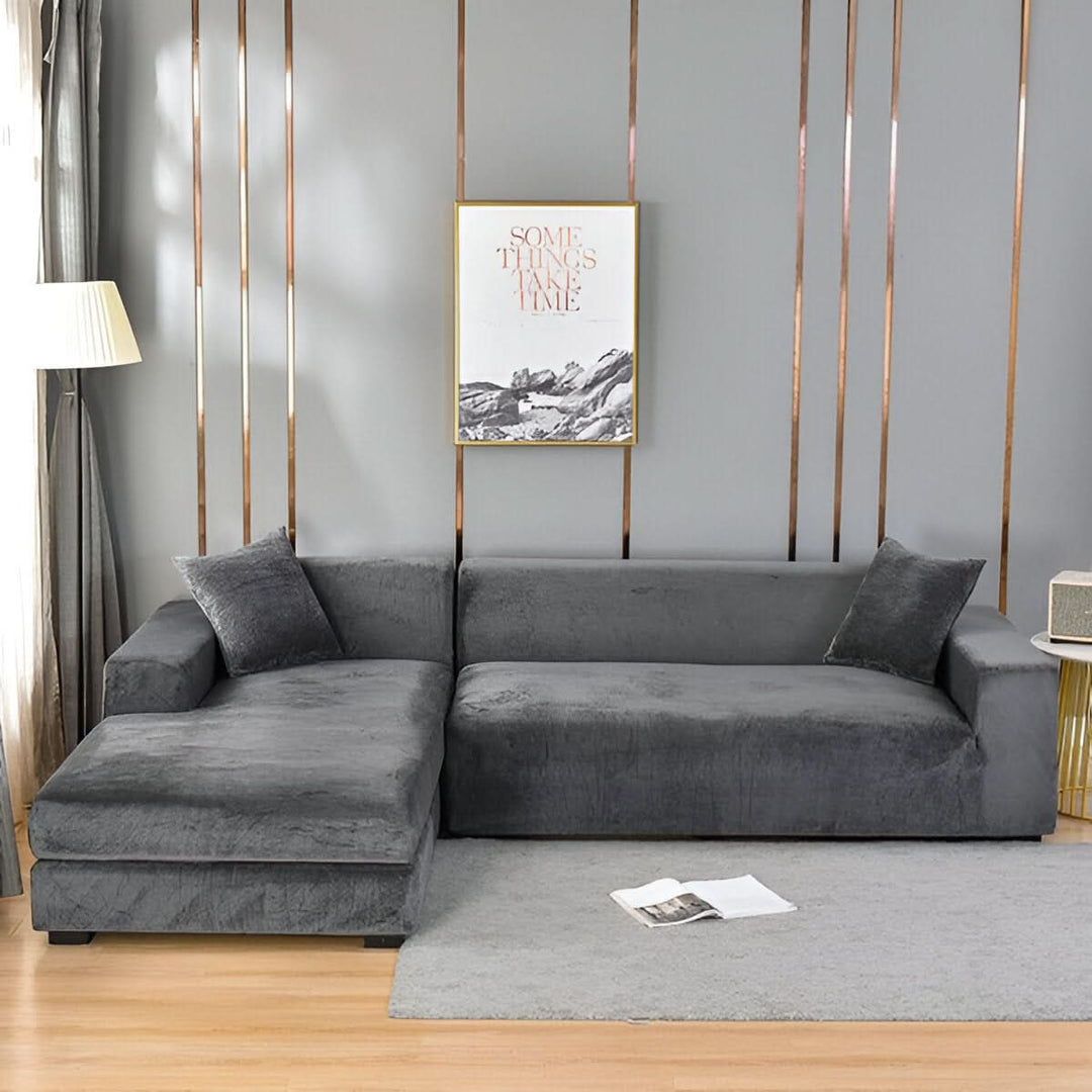 Housse de canapé extensible grise, protection meuble et déco salon moderne, facile d'entretien.