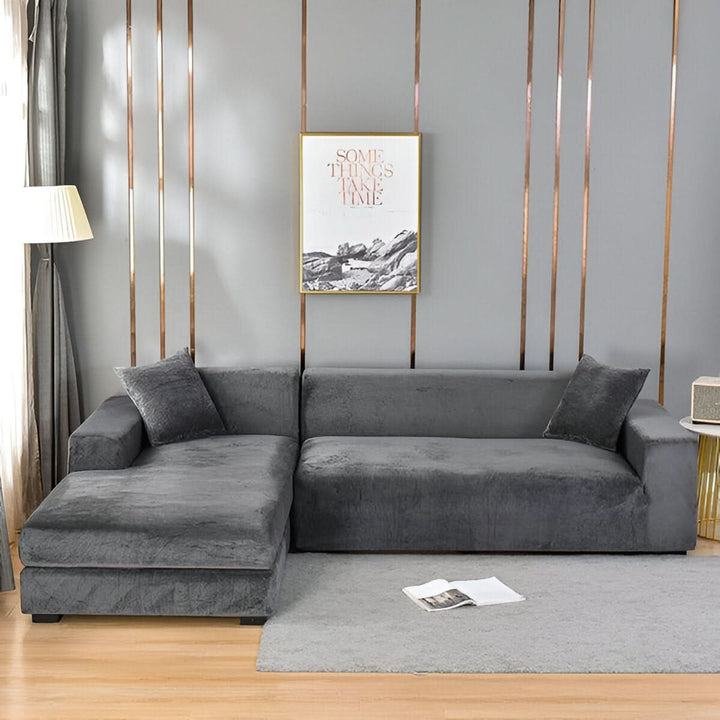Housse de canapé extensible grise, protection meuble et déco salon moderne, facile d'entretien.