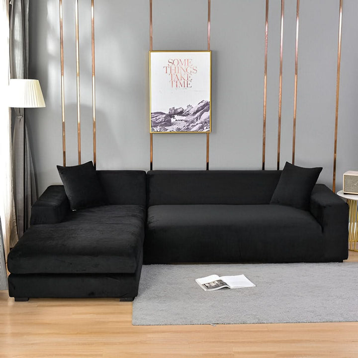 Housse de canapé élastique grise, s'adapte parfaitement, rénove et protège votre meuble de salon.