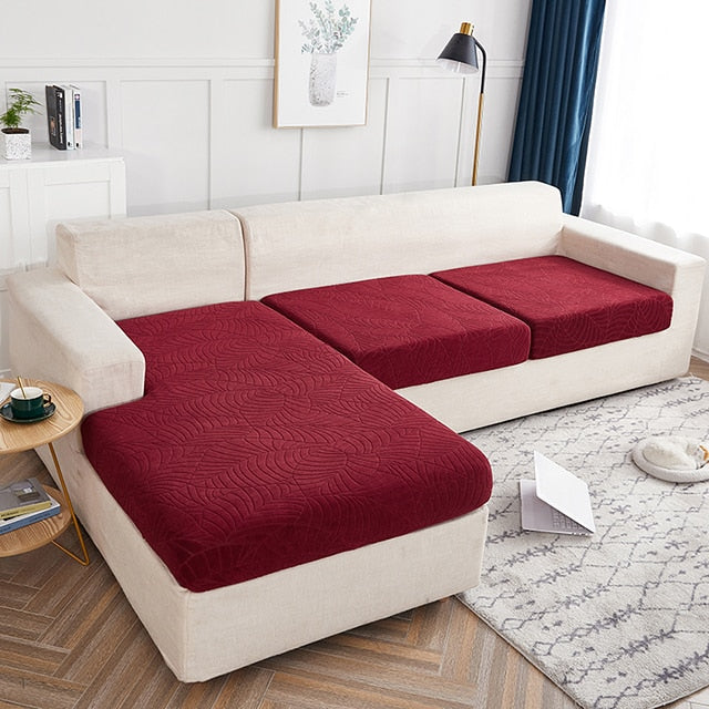 Housse de canapé en polyester extensible et imperméable. Lavable, antitache, protège contre liquides et usure quotidienne.
