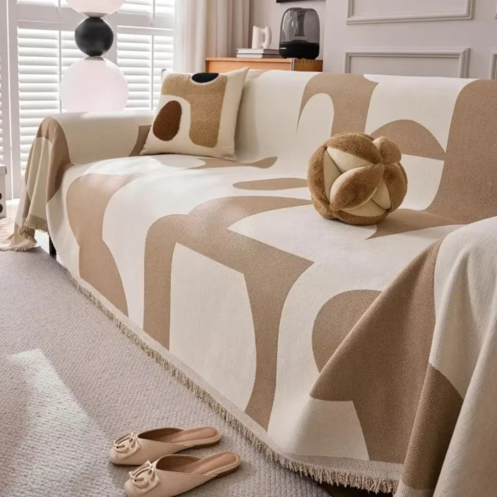 Housse de canapé géométrique moderne, motif tendance pour un salon chic, protection durable.
