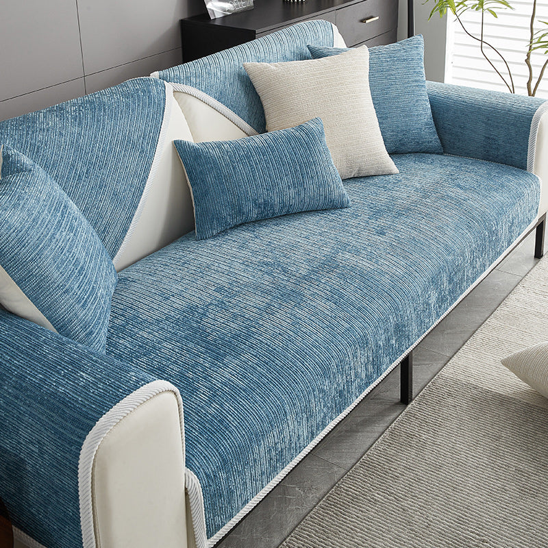 Housse de canapé moderne pour salon, protège votre meuble avec style épuré. Disponible en plusieurs tailles et teintes.