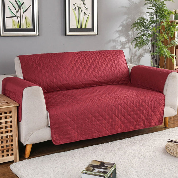 Housse de canapé extensible et confortable, protection matelassée contre les animaux et les taches. Style moderne.