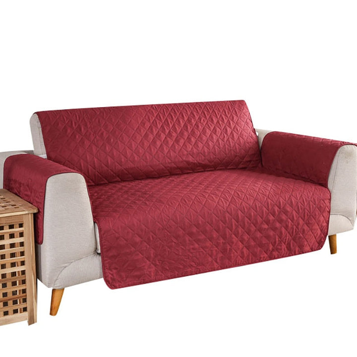 Housse de canapé anti-taches imperméable, conçue pour les familles avec animaux. Confort accru et durabilité.