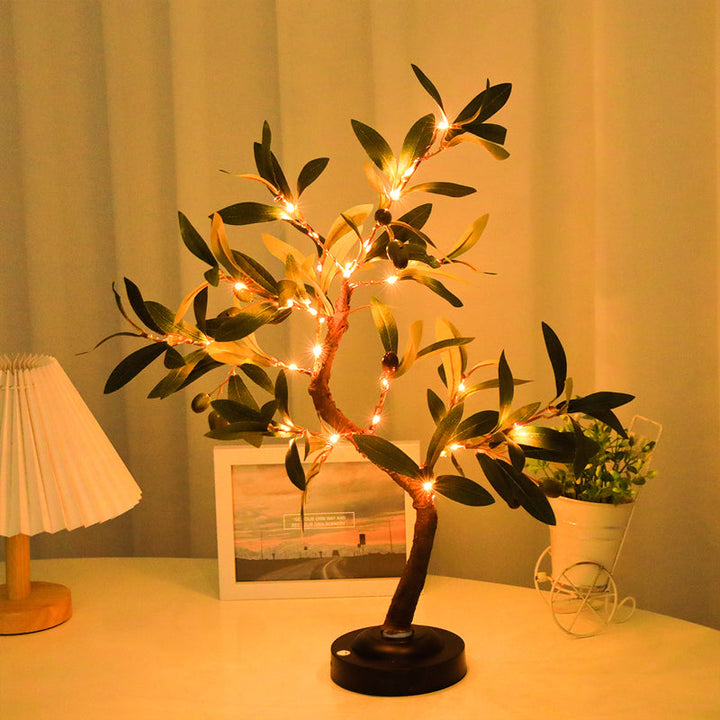 Luminaire LED design arbre pour table, apporte une ambiance chaleureuse et moderne à votre intérieur.